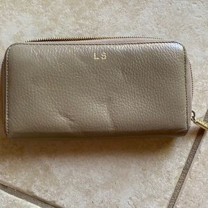Cuyana Tan full size wallet that has 2 zippers and initials LS